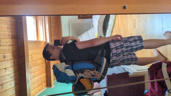 Me with my backpack on, at home