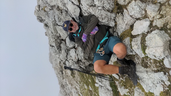 My dad resting on a rock